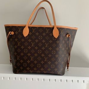 Authentic Louis Vuitton Neverfull MM. perfect condition Used only 5 times .